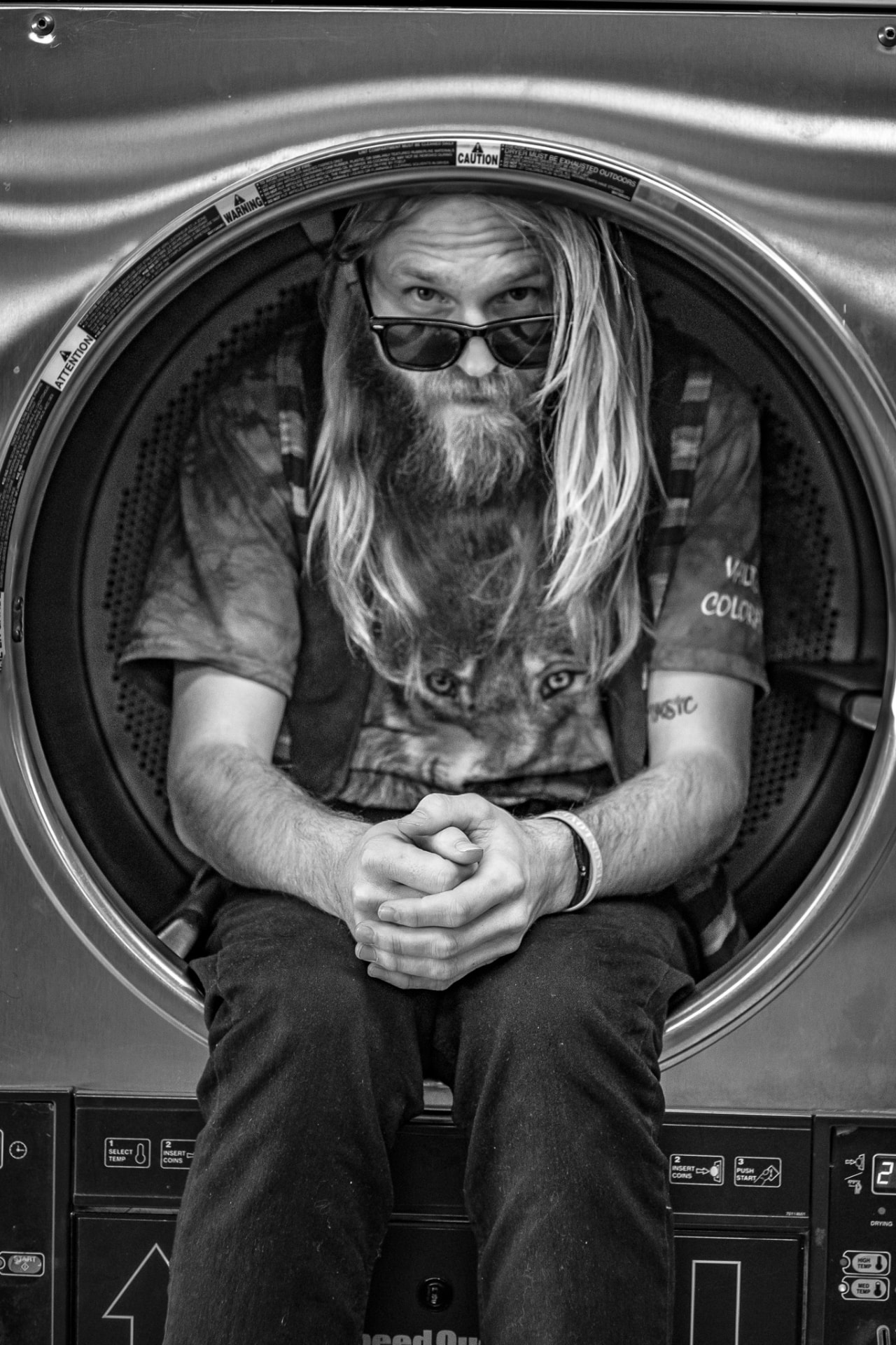 Black and white laundromat dryer portrait